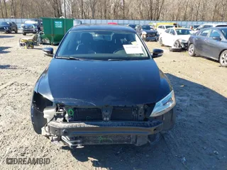 2014 Volkswagen Jetta Sedan SE w/Connectivity with VIN 3VWB07AJ4EM332601, listed as a IAAI auction lot 41430088 with 133,623 mi miles. Bid and sale history available at carsss.com. Image 13.