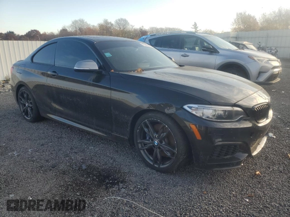 2016 BMW 2 Series M235i xDrive with VIN WBA1J9C57GV371986, listed as a Copart auction lot 77871604 with 0 mi miles and Salvage Title. Bid and sale history available at carsss.com. Image 4.