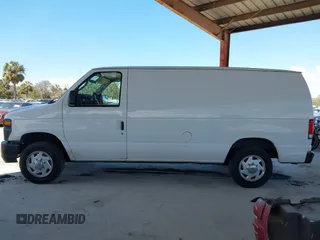 2014 Ford Econoline Cargo Commercial with VIN 1FTNE1EW1EDA66485, listed as a IAAI auction lot 41654271 with 304,974 mi miles and . Bid and sale history available at DreamBid. Image 14.