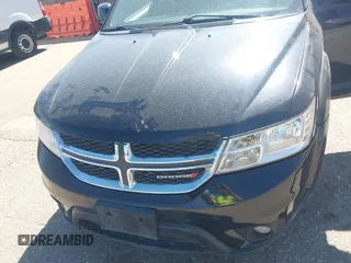 2016 Dodge Journey SXT with VIN 3C4PDDBG3GT215910, listed as a IAAI auction lot 41798779 with 165,505 mi miles. Bid and sale history available at carsss.com. Image 6.