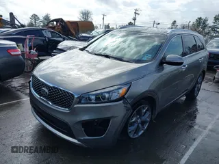 2016 Kia Sorento SXL with VIN 5XYPK4A19GG089000, listed as a IAAI auction lot 41726853 with 73,809 mi miles. Bid and sale history available at carsss.com. Image 2.