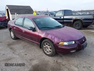 1998 Chrysler Cirrus LXi z VIN 1C3EJ56H4WN103676, wystawiony jako IAAI lot #41554781 z przebiegiem 131 923 mil mil oraz . Historia ofert i sprzedaży dostępna na DreamBid. Obrazek 1.