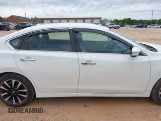 2018 Nissan Altima S with VIN 1N4AL3AP9JC128686, listed as a IAAI auction lot 42038517 with 159,024 mi miles and . Bid and sale history available at DreamBid. Image 13.