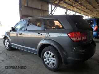 2014 Dodge Journey American Value with VIN 3C4PDCAB2ET301688, listed as a Copart auction lot 54731275 with 108,064 mi miles and Salvage Title. Bid and sale history available at DreamBid. Image 2.
