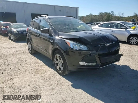 2016 Ford Escape SE with VIN 1FMCU9GX1GUC24692, listed as a Copart auction lot 88102815 with 114,900 mi miles and Salvage Title. Bid and sale history available at DreamBid. Image 14.