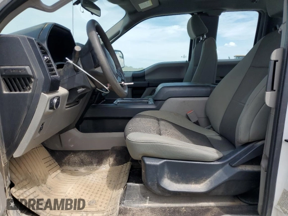 2020 Ford F-150 XL with VIN 1FTEX1C57LKE13749, listed as a Copart auction lot 60302515 with 164,882 mi miles and Clean title. Bid and sale history available at DreamBid. Image 7.