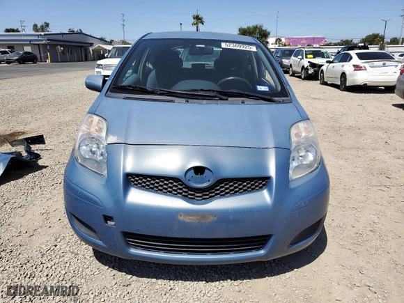 2009 Toyota Yaris with VIN JTDJT903995238147, listed as a Copart auction lot 52369925 with 124,921 mi miles and Salvage Title. Bid and sale history available at carsss.com. Image 5.