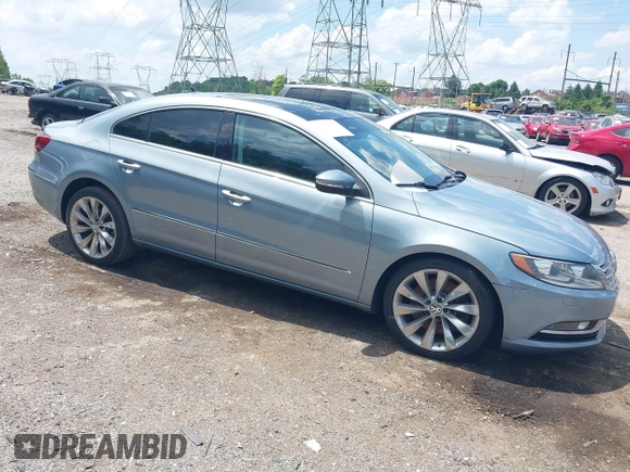 2013 Volkswagen CC Executive z VIN WVWGU7AN3DE524175, wystawiony jako IAAI lot #42401952 z przebiegiem 165 023 mil mil oraz . Historia ofert i sprzedaży dostępna na DreamBid. Obrazek 1.