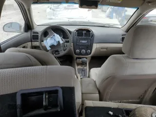 2008 Kia Spectra EX with VIN KNAFE121185494453, listed as a Copart auction lot 68115874 with 0 mi miles and Salvage Title. Bid and sale history available at carsss.com. Image 8.