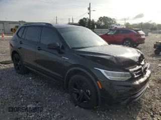 2024 Volkswagen Tiguan SE R-Line Black with VIN 3VVCB7AX9RM000859, listed as a Copart auction lot 59664795 with 35,569 mi miles and Salvage title. Bid and sale history available at DreamBid. Image 4.