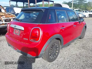 2015 MINI Hardtop 4 Door z VIN WMWXS5C57F2C63418, wystawiony jako IAAI lot #41938785 z przebiegiem 101 712 mil mil oraz . Historia ofert i sprzedaży dostępna na DreamBid. Obrazek 4.