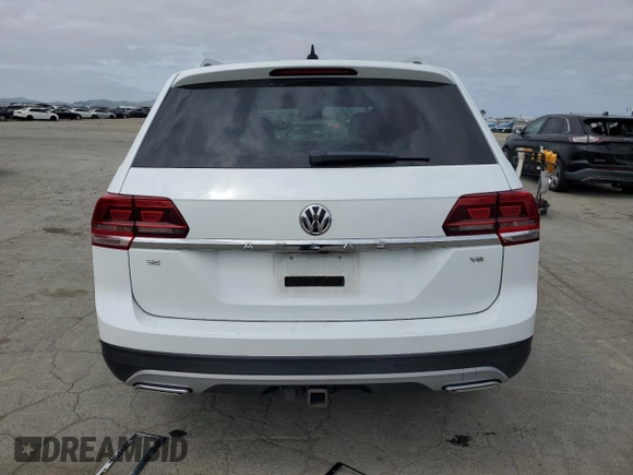 2019 Volkswagen Atlas SE with VIN 1V2WR2CA1KC603605, listed as a Copart auction lot 54623385 with 72,366 mi miles and Salvage title. Bid and sale history available at DreamBid. Image 6.