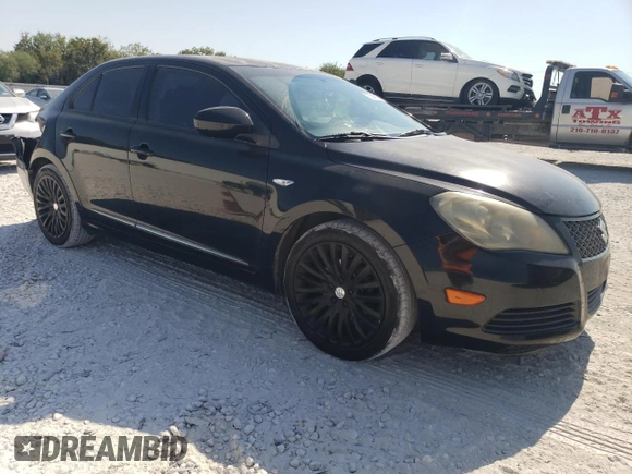 2011 Suzuki Kizashi SE z VIN JS2RE9A34B6111601, wystawiony jako Copart lot #75945784 z przebiegiem 128 926 mil mil oraz Szkoda całkowita • Salvage title. Historia ofert i sprzedaży dostępna na DreamBid. Obrazek 4.