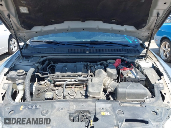 2013 Ford Taurus SEL with VIN 1FAHP2E83DG111766, listed as a IAAI auction lot 42041504 with 158,468 mi miles. Bid and sale history available at carsss.com. Image 10.
