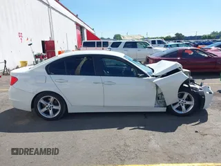 2014 BMW 3 Series 328i with VIN WBA3C1C56EK110898, listed as a IAAI auction lot 42207488 with Not provided miles and . Bid and sale history available at DreamBid. Image 13.