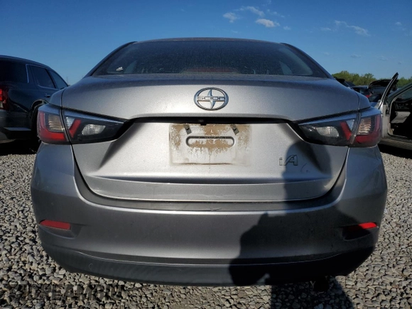 2016 Scion iA with VIN 3MYDLBZV6GY104450, listed as a Copart auction lot 52355255 with 195,958 mi miles and Salvage Title. Bid and sale history available at carsss.com. Image 6.