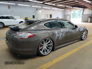 2010 Porsche Panamera Turbo z VIN WP0AC2A73AL090361, wystawiony jako Copart lot #59045905 z przebiegiem Nie podano mil oraz Czysty tytuł • Clean title. Historia ofert i sprzedaży dostępna na DreamBid. Obrazek 3.