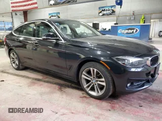 2019 BMW 3 Series 330i xDrive with VIN WBA8Z9C58KB220690, listed as a Copart auction lot 87442724 with 59,204 mi miles and Clean Title. Bid and sale history available at carsss.com. Image 4.