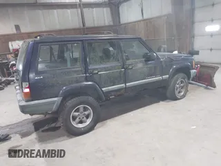 1999 Jeep Cherokee Sport with VIN 1J4FF68S2XL602709, listed as a IAAI auction lot 41177232 with 1 mi miles. Bid and sale history available at carsss.com. Image 4.