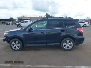 2014 Subaru Forester 2.5i Limited with VIN JF2SJAHC9EH448029, listed as a IAAI auction lot 41919935 with 153,728 mi miles. Bid and sale history available at carsss.com. Image 14.