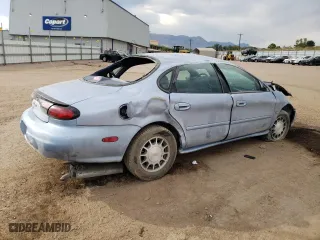1998 Ford Taurus SE Comfort with VIN 1FAFP53S7WG223397, listed as a Copart auction lot 74794624 with 76,614 mi miles and Salvage Title. Bid and sale history available at carsss.com. Image 3.