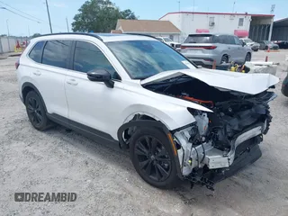 2025 Honda CR-V Sport Touring with VIN 5J6RS6H99SL012005, listed as a IAAI auction lot 42101669 with 7,945 mi miles and . Bid and sale history available at DreamBid. Image 1.