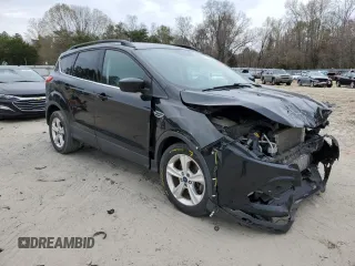 2016 Ford Escape SE with VIN 1FMCU9GX5GUB02417, listed as a Copart auction lot 51762985 with 97,535 mi miles and Salvage Title. Bid and sale history available at DreamBid. Image 4.