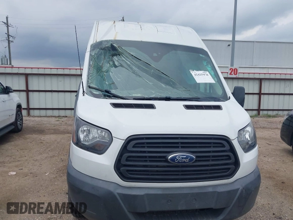 2018 Ford Transit z VIN 1FTBW3XMXJKB24221, wystawiony jako IAAI lot #42425978 z przebiegiem 77 666 mil mil oraz . Historia ofert i sprzedaży dostępna na DreamBid. Obrazek 13.