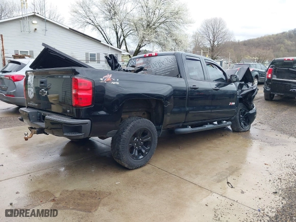 2018 Chevrolet Silverado 1500 LT with VIN 2GCVKREC8J1111943, listed as a IAAI auction lot 41869301 with 64 mi miles. Bid and sale history available at carsss.com. Image 4.