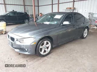 2014 BMW 3 Series 320i xDrive with VIN WBA3C3G5XENS67385, listed as a IAAI auction lot 42148360 with 98,216 mi miles and . Bid and sale history available at DreamBid. Image 2.