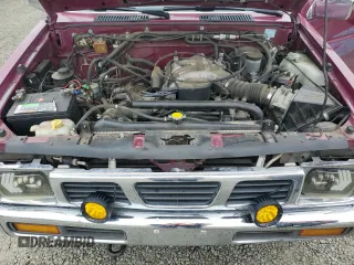 1995 Nissan Frontier SE z VIN 1N6HD16Y0SC364833, wystawiony jako Copart lot #48259485 z przebiegiem 152 592 mil mil oraz Szkoda całkowita • Salvage title. Historia ofert i sprzedaży dostępna na DreamBid. Obrazek 12.