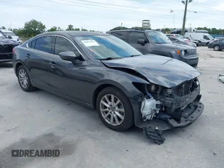 2016 Mazda 6 i Sport with VIN JM1GJ1U53G1409301, listed as a IAAI auction lot 42057930 with 100,434 mi miles and . Bid and sale history available at DreamBid. Image 1.