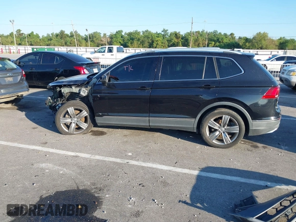 2018 Volkswagen Tiguan SEL Premium with VIN 3VV5B7AX1JM002585, listed as a IAAI auction lot 40495823 with 82,376 mi miles and . Bid and sale history available at DreamBid. Image 15.