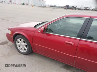 2001 Cadillac Seville z VIN 1G8KS54Y91U227846, wystawiony jako IAAI lot #42134095 z przebiegiem 216 766 mil mil oraz . Historia ofert i sprzedaży dostępna na DreamBid. Obrazek 18.