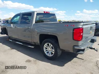 2017 Chevrolet Silverado 1500 LT with VIN 3GCUKREC2HG173402, listed as a IAAI auction lot 42041848 with 40,358 mi miles and . Bid and sale history available at DreamBid. Image 3.