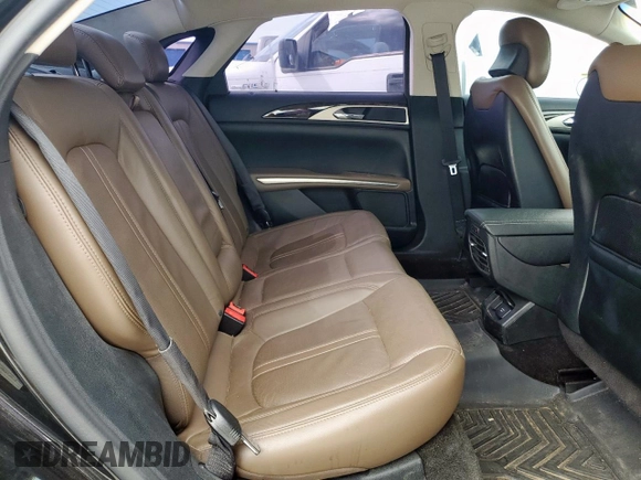 2015 Lincoln MKZ с VIN 3LN6L2J99FR608534, выставлен на аукционе Copart как лот 63588325 с пробегом 96 684 миль миль и Списание • Salvage title. История ставок и продаж доступна на DreamBid. Изображение 10.