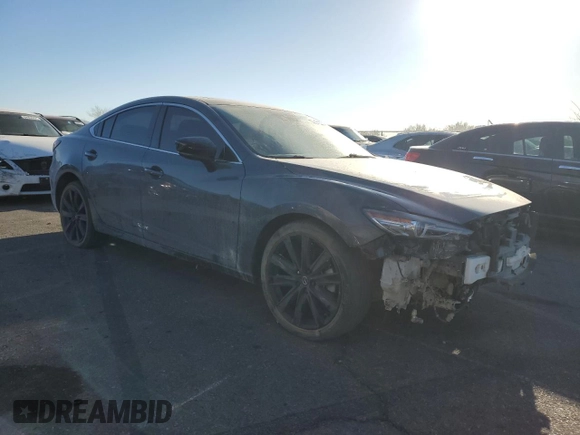 2021 Mazda 6 Carbon Edition with VIN JM1GL1WY0M1610974, listed as a Copart auction lot 84961604 with 55,107 mi miles and Salvage Title. Bid and sale history available at DreamBid. Image 4.