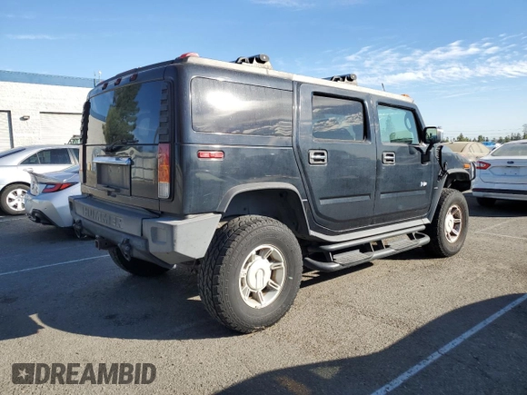 2003 Hummer H2 with VIN 5GRGN23U33H114928, listed as a Copart auction lot 78247874 with 290,954 mi miles and Clean Title. Bid and sale history available at carsss.com. Image 3.
