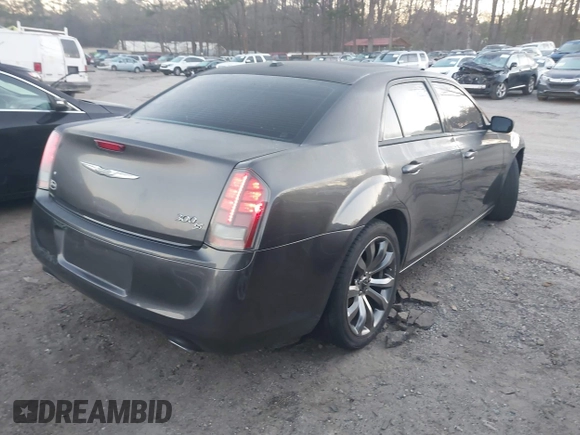 2014 Chrysler 300 S with VIN 2C3CCABG2EH352220, listed as a IAAI auction lot 41796284 with 127,070 mi miles and . Bid and sale history available at DreamBid. Image 4.