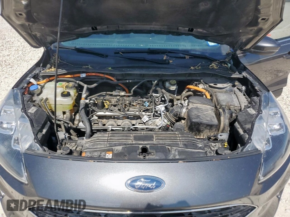 2020 Ford Escape Titanium Hybrid z VIN 1FMCU0DZ1LUC38345, wystawiony jako Copart lot #59628985 z przebiegiem 86 917 mil mil oraz Szkoda całkowita • Salvage title. Historia ofert i sprzedaży dostępna na DreamBid. Obrazek 12.