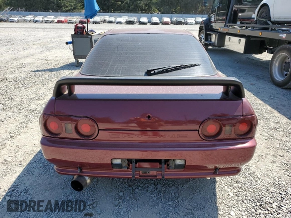 1990 Nissan Skyline z VIN BNR32011442, wystawiony jako Copart lot #64651064 z przebiegiem 118 579 mil mil oraz Czysty tytuł • Clean title. Historia ofert i sprzedaży dostępna na DreamBid. Obrazek 6.
