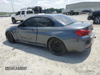 2018 BMW M4 with VIN WBS4Z9C50JED22222, listed as a Copart auction lot 57043595 with 71,899 mi miles and Salvage title. Bid and sale history available at DreamBid. Image 2.