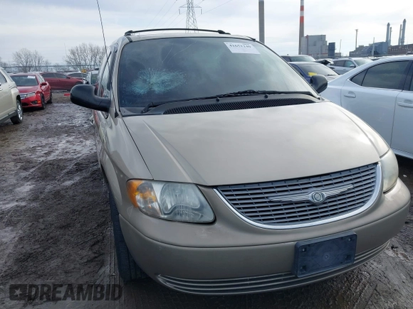 2002 Chrysler Town & Country EX with VIN 2C8GP74L62R524896, listed as a IAAI auction lot 41651240 with 128,983 mi miles and . Bid and sale history available at carsss.com. Image 1.