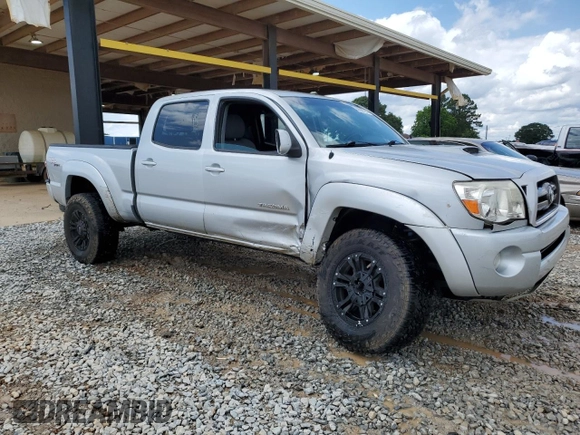 2010 Toyota Tacoma with VIN 3TMMU4FN8AM023377, listed as a Copart auction lot 58592735 with 245,178 mi miles and Salvage title. Bid and sale history available at DreamBid. Image 4.