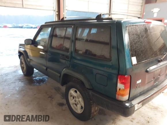 1997 Jeep Cherokee Sport with VIN 1J4FJ68S9VL594152, listed as a IAAI auction lot 41732573 with 65,316 mi miles. Bid and sale history available at carsss.com. Image 3.