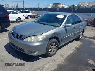 2006 Toyota Camry STD with VIN 4T1BE32K06U675483, listed as a IAAI auction lot 42001170 with 142,783 mi miles. Bid and sale history available at carsss.com. Image 2.