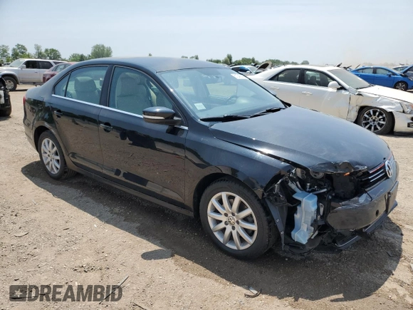 2013 Volkswagen Jetta SE with VIN 3VWDX7AJ4DM257210, listed as a Copart auction lot 61043365 with 85,166 mi miles and Salvage title. Bid and sale history available at DreamBid. Image 4.