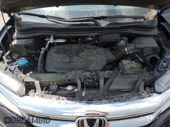 2022 Honda Pilot Touring 7-Passenger with VIN 5FNYF5H64NB017528, listed as a Copart auction lot 65406285 with 64,652 mi miles and Salvage title. Bid and sale history available at DreamBid. Image 12.