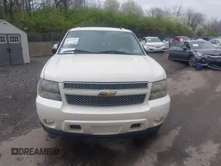 2010 Chevrolet Suburban LTZ with VIN 1GNUKKE35AR129351, listed as a IAAI auction lot 41971625 with 234,487 mi miles. Bid and sale history available at carsss.com. Image 12.