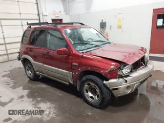 2002 Suzuki Grand Vitara JLX z VIN JS3TD62VX24155102, wystawiony jako IAAI lot #41603245 z przebiegiem 152 657 mil mil oraz . Historia ofert i sprzedaży dostępna na DreamBid. Obrazek 1.